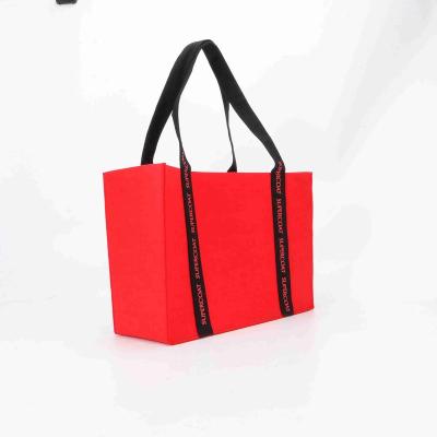 China Fashion Promotional Custom Logo Felt Shopping Bag Webbing Hand Strap Red Tote Bag for sale