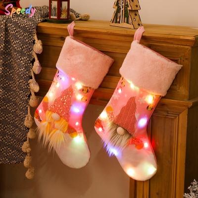 China Festival Stuff Bag 10 MOQ LED Christmas Decoration Christmas Stocking Pink Lighted Children's Gift Bag Ornaments for sale