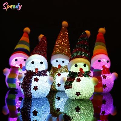 China Festival Stuff Christmas Eve Decorations Flash Luminous Snowman Table Decorations Creative Children's Gifts 10 MOQ LED Ornaments for sale