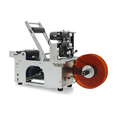 China Food Sticker Labeling Machine Semi Automatic Tabletop Labeler for Round Pet Bottles Plastic Glass Metal Cans for sale