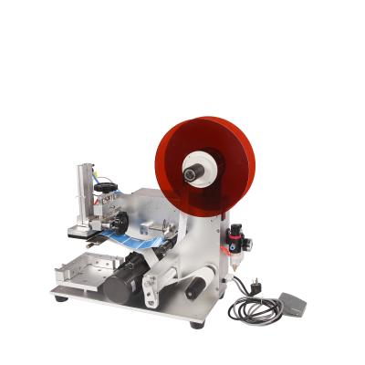 China semi automatic food sticker labeling machine for round bottles for sale