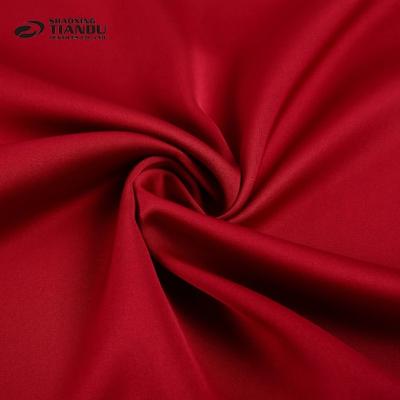 China Memory latest design red plain dyed new fashion polyester bulk satin woven fabric Pakistan for sale