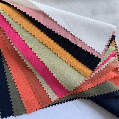 China GRS Certificate Tear-Resistant Recycle Color Dye 100% Woven Polyester Crepe CDC Fabric For Women Garment for sale