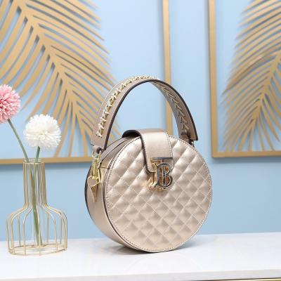 China Summer fashion PORTABLE handbags round classic cross - body bags for ladies small handbags famous branded handbag for sale