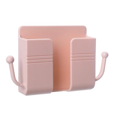 China Viable Mobile Left Charging Remote Control Wall Beside Organizer Storage Box Plastic Charging Remote Wall Brackets Holder for sale