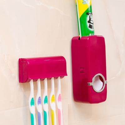 China Durable Toothpaste Dispenser Toothbrush Holder Wall Mount Holder Dustproof Bathroom Accessories Set Toothpaste Squeezer Tooth for sale