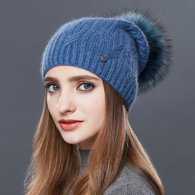 China COMMON Wholesale Knit Pattern Beanie For Women Winter Hats With Real Fur Pompom Logo Solid Color Custom Hats for sale