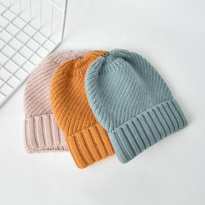 China COMMON Warm Sale Winter Wool Knitted Hats Twill Custom Cuff Loose Beanies For Women Casual Solid Ski Hat Wholesale for sale