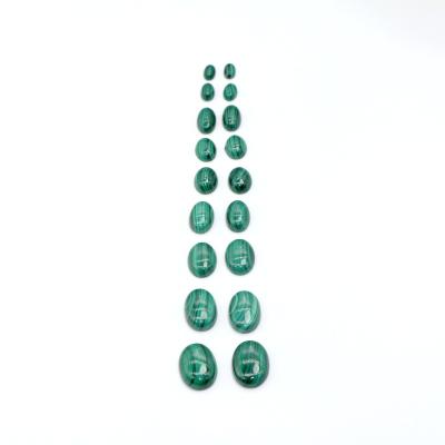 China Fashionable Natural Wholesale AAA Grade Rare Malachite Oval Cut Loose Malachite Gemstone For Jewelry Making for sale