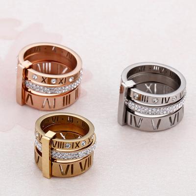 China TRENDY Two Tone Micro Diamond Roman Alphabet Hollow Ring for sale