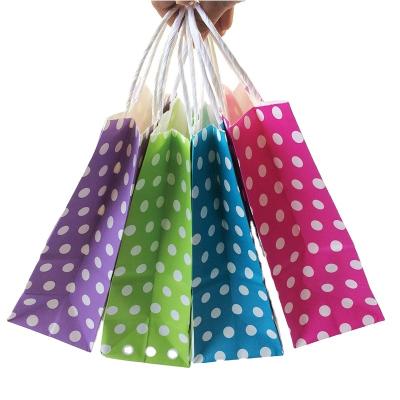 China Recyclable Polka Dot Kraft Paper Gift Bag With Handles Fashionable Wedding Birthday Party Paper Bag for sale