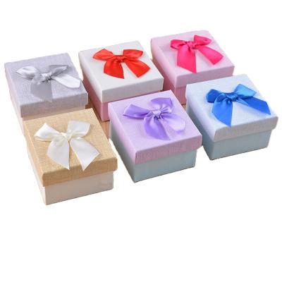 China Bow Gift Jewelry Watch Box Sky and Earth Cover Jewelry Packaging Box Factory Customized Exquisite Biodegradable Jewelry Gift Box for sale