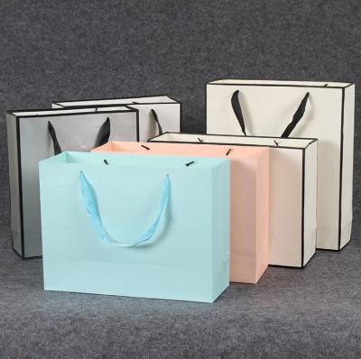 China Recyclable Custom Logo Printing Multicolor Souvenir Bag Packaging Paper Bags for sale