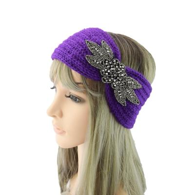 China Best selling European and American style woolen cross ear protection knit flower winter high quality knitted headbands for women for sale