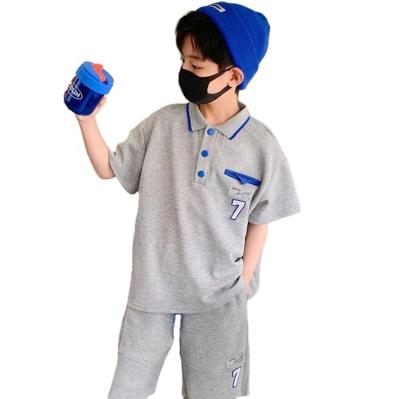 China New Boy's Polo Short-Sleeved Sports Children Two-Piece Summer Preppy Style Sports For Small And Medium Kids for sale