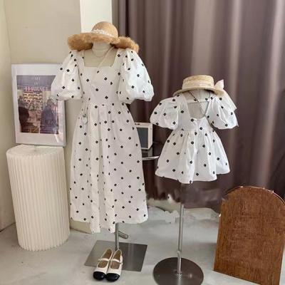 China Mommy and Me QUICK DRY Toddler Parent-child Dress Summer Dress Outfit Baby White Spotted Dress for sale