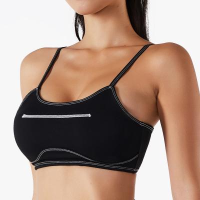 China Breathable Soft Naked Apparel Spaghetti Strap Yoga Bra Women Training Wear Sports Bra Gym Fitness Wear Nylon Padded Bra Wholesale for sale