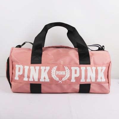 China 2021 Hot Selling Customized Hot Selling Nylon Waterproof Pink Women Gym Yoga Duffel Bags Girls Large Capacity Goods Logo 2021 Travel Bag for sale