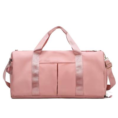 China 2021 Hot Selling Customized Hot Selling Nylon Waterproof Pink Women Gym Yoga Duffel Bags Girls Large Capacity Goods Logo 2021 Travel Bag for sale