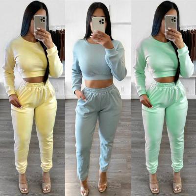 China Autumn Sustainable Outfits For Women Leisure Wear Solid Crewneck Long Sleeve Cropped Top 2 Piece Pant Sets for sale