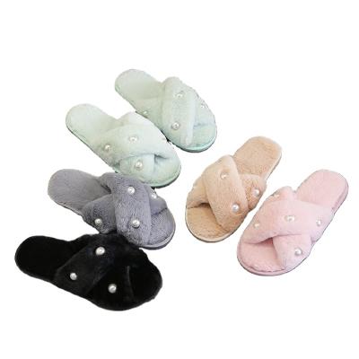 China CUSTOMER REVIEWS (0)‎ 2021 New Wholesale Plush Slippers Female Flat Heel Word Pearl Fashion Wear Cross Plush Home Slippers for sale