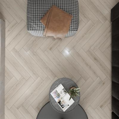 China 8mm EIR Fishbone Wood Herringbone Wood Flooring With Smooth Walnut Laminate Surface Flooring for sale