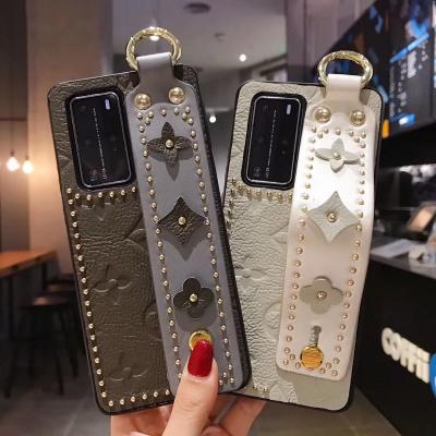 China Luxury Genius Leather Female Strap Genie Case Leather Phone Case For Samsung s20/s20+ Strong Back Case for sale