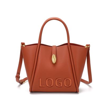 China Water Resistant Ladies Genuine Leather Shoulder Tote Bag Custom Logo Trapeze Purses and Handbags Wholesale for Women 2022 Luxury for sale