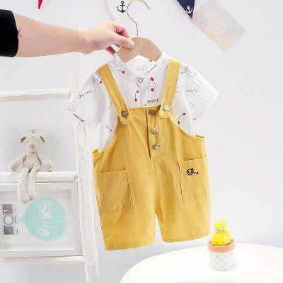 China Korean version of the fashion children's wear suit cute printed smiling children's casual sleeve summer face suit strap shorts for sale