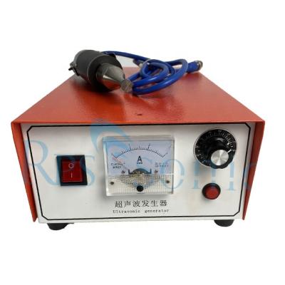 China Portable Ultrasonic Spot Welding 28Khz Handheld Ultrasonic Spot Welding Machine For Tape Welding for sale