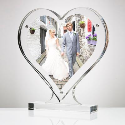 China Factory price environment friendly wholesale cheap heart shaped acrylic photo frame with writing for sale