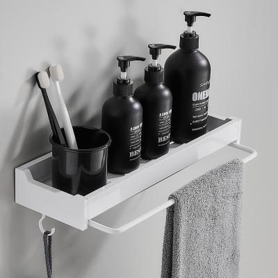 China Sustainable Self Adhesive Wall Mounted Storage Shelf Bathroom Rack With Towel Rail And Hooks for sale