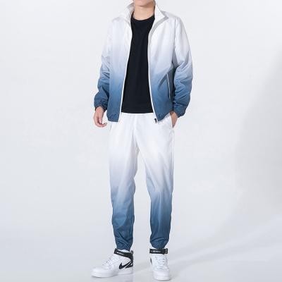 China Latest Design Low MOQ Shade Custom Sports Gradient Tracksuits Men Viable for sale