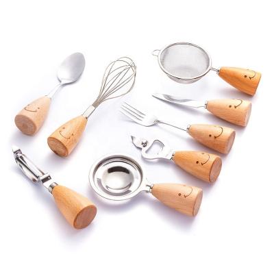 China Sustainable Amazon cute smiling face wooden handle stainless steel tableware 8-piece western tableware set for sale