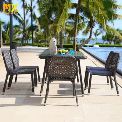 China Weather Furniture Affordable Outdoor Asian Style Fabric Metal Restaurant Dining Table Set Waterproof Outdoor Glass for sale