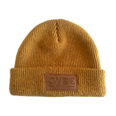 China COMMON High Quality Leather Patch Beanie Wholesale Acrylic Beanie Custom Knit Hats for sale