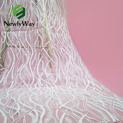 China Shrink-Resistant Luxury 3D Glitter Lace Up Mesh Tulle Fabric For Wedding Event Dress Dresses for sale