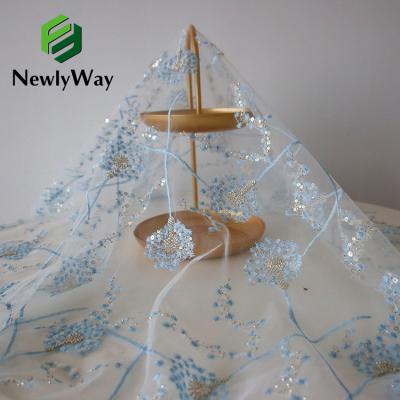 China New Arrival 2021 Viable Wholesale Luxury Heavy Beaded Tulle Embroidered Lace Fabric For Women's Dress for sale