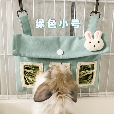 China New Design Automatic Small Cute Animal Hanging Bunny Hay Feeder Bag for sale