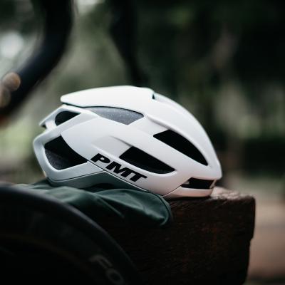 China Durable PMT Pneumatic Cycling Helmet For Teens And Mountain Bike Boys Integrated Helmet Breathable Road Bike Helmet for sale