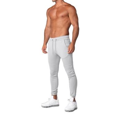 China 2021 Hot Selling High Quality Wholesale Men Cotton Elastic Skinny Pants Breathable Fitness Pants Track Training Sports Pants For Men for sale