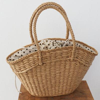 China Wholesale Durable High Quality Straw Woven Women Handbag Beach Drawstring Bag Beach Straw Bags for sale