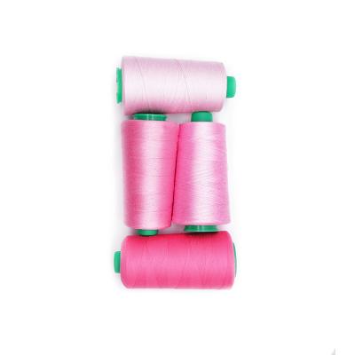 China Special high tenacity brand 100% spun polyester best 40/2 durable pink sewing machine thread for medium weight fabric for sale