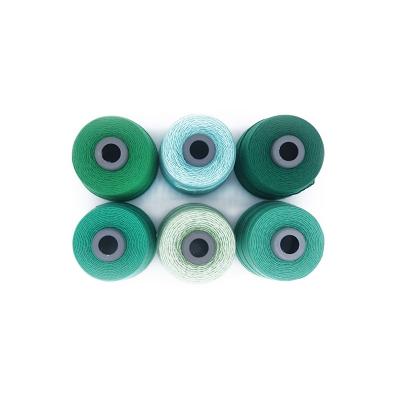 China High Tenacity Hot Sales 100% Single Spun Polyester 20/3 Item Green Top Selling Sewing Thread For Heavy Fabric for sale