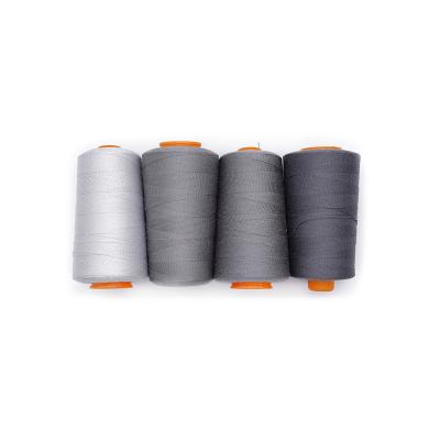 China High Tenacity Manufacturer Newest 100% Spun Polyester 20/2 High Tenacity Gray Jeans Sewing Thread For Garment for sale