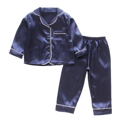 China Baby's long-sleeved suit children's boys and girls clothes pants color draw cartoon breathable solid pajamas for sale