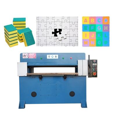 China Four Column Plastic Hydraulic Paper Puzzle Cutting Machine for sale