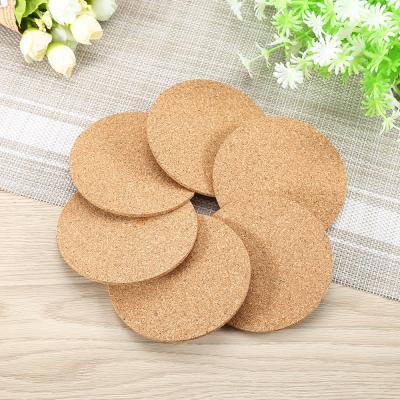 China Sustainable Natural Cork Round Cup Mat Drink Coasters Patterned Heat Insulation Pot Holder Mats For Coffee for sale