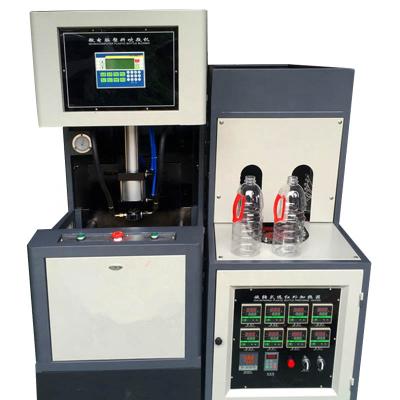 China Semi-automatic PC Blow Machine Semi-automatic Stretch Blow Molding Machine For Drinking Bottles for sale