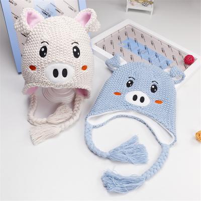 China Imitate the animal modeling of the beautiful warm children's knitted hat hearing protection children's hats autumn and winter pig for sale